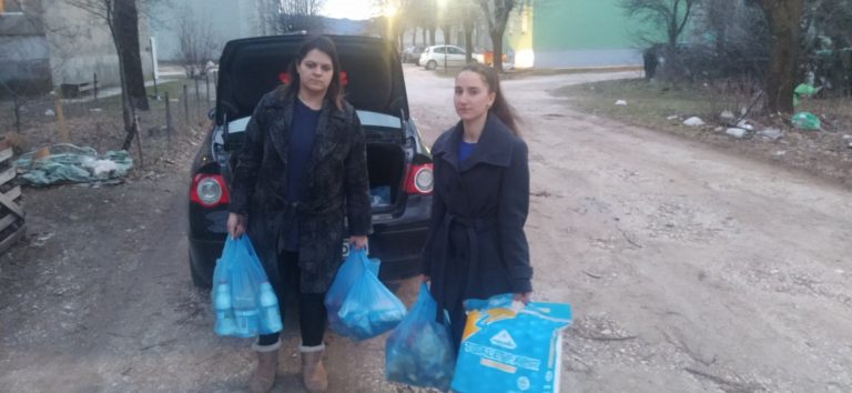 members delivering aid to the Todorovic family