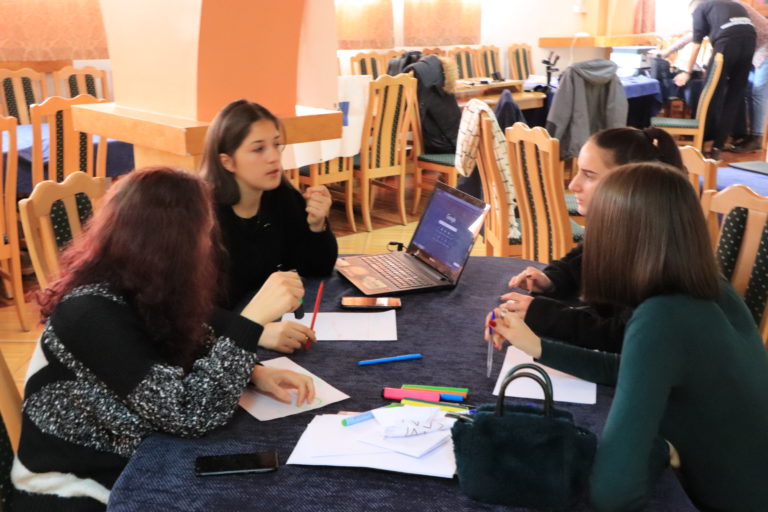participants sharing ideas during seminar